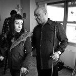 Frank gives Ilana a tour of his home